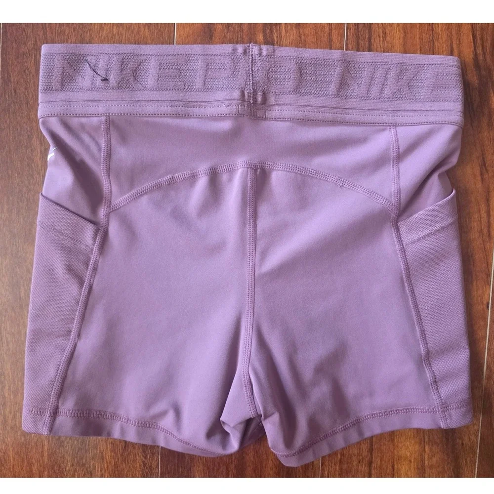 Nike Pro Dri-FIT Shorts Womens Small Purple Mauve Pockets Black Running